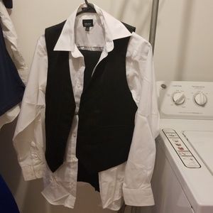 A 3 piece black and white suit